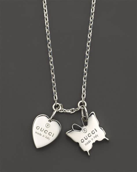 gucci trademark silver butterfly and heart necklace|gucci engraved heart necklace.